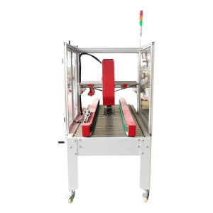 RUBBER automatische Kartonklebemaschine von rechts gesehen
